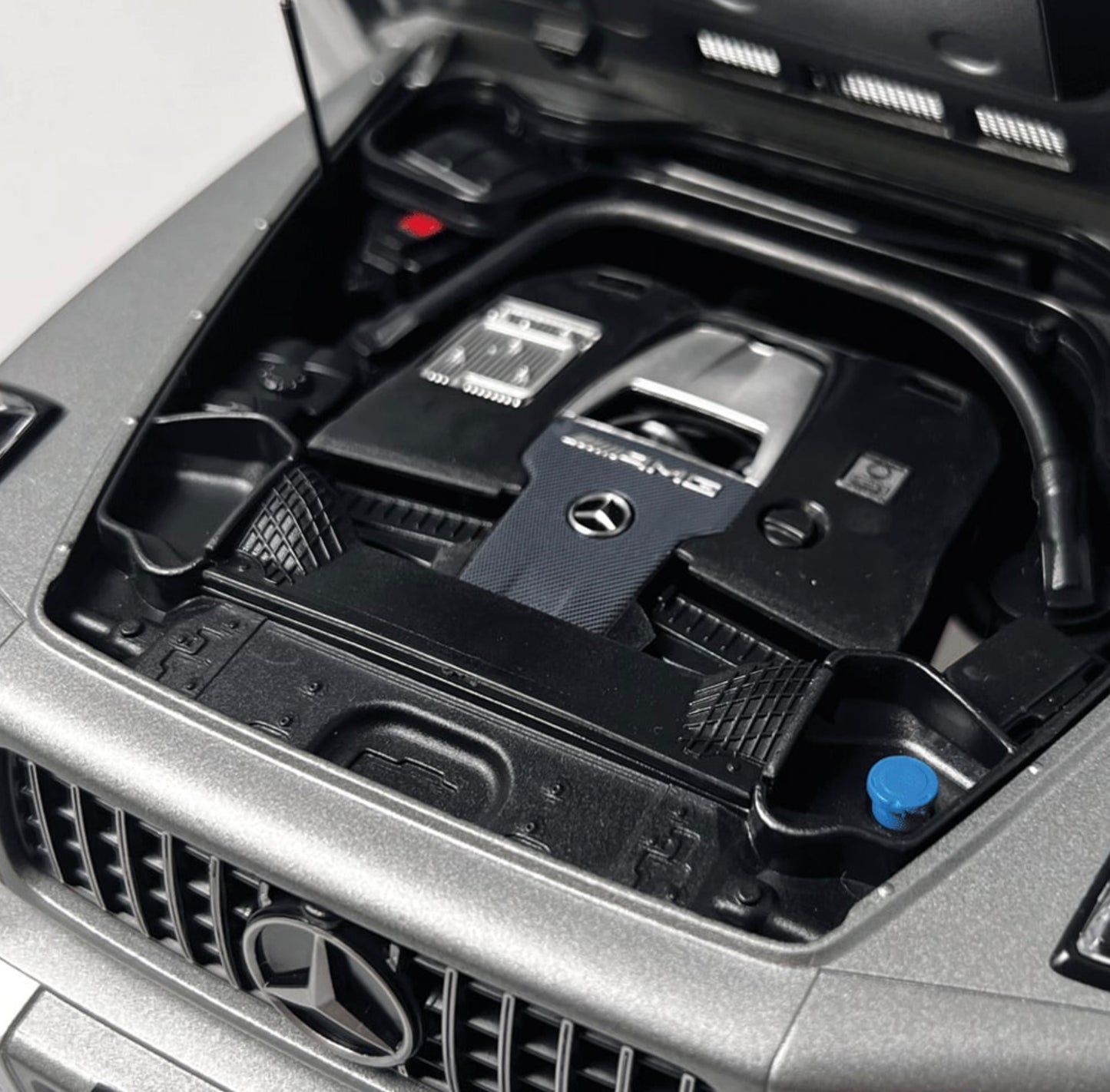 NZG 1:12 - Mercedes AMG G 63 4x4² W463 Standard, platin magno